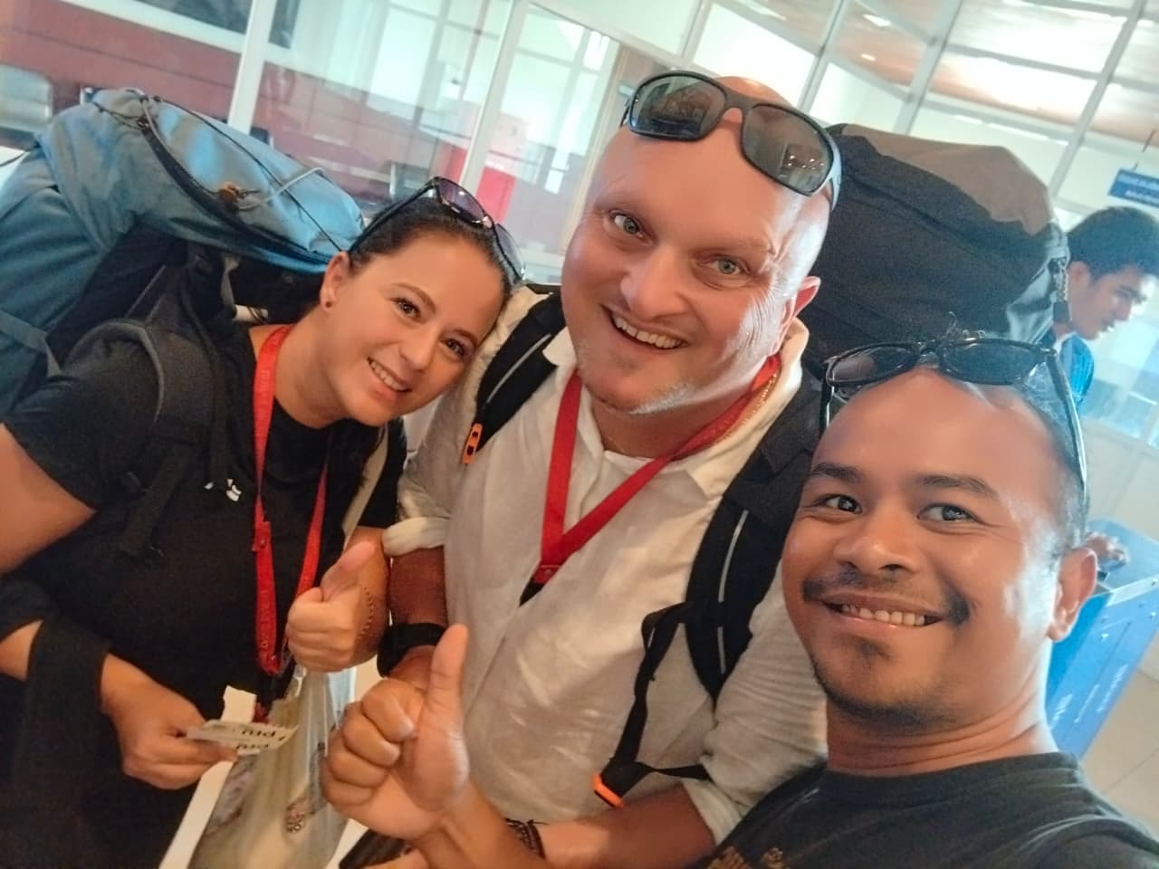 Travelers with Ketut at the airport