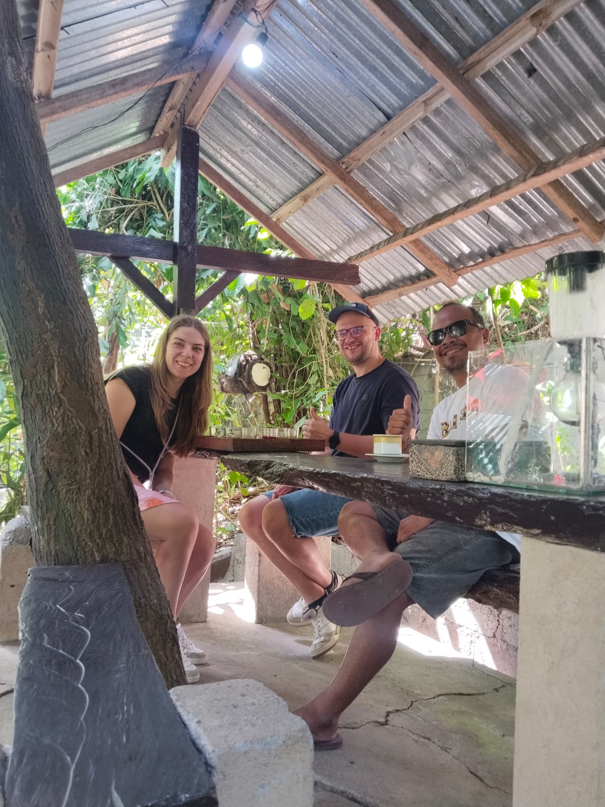 Guests at an outdoor coffee tasting during a custom tour